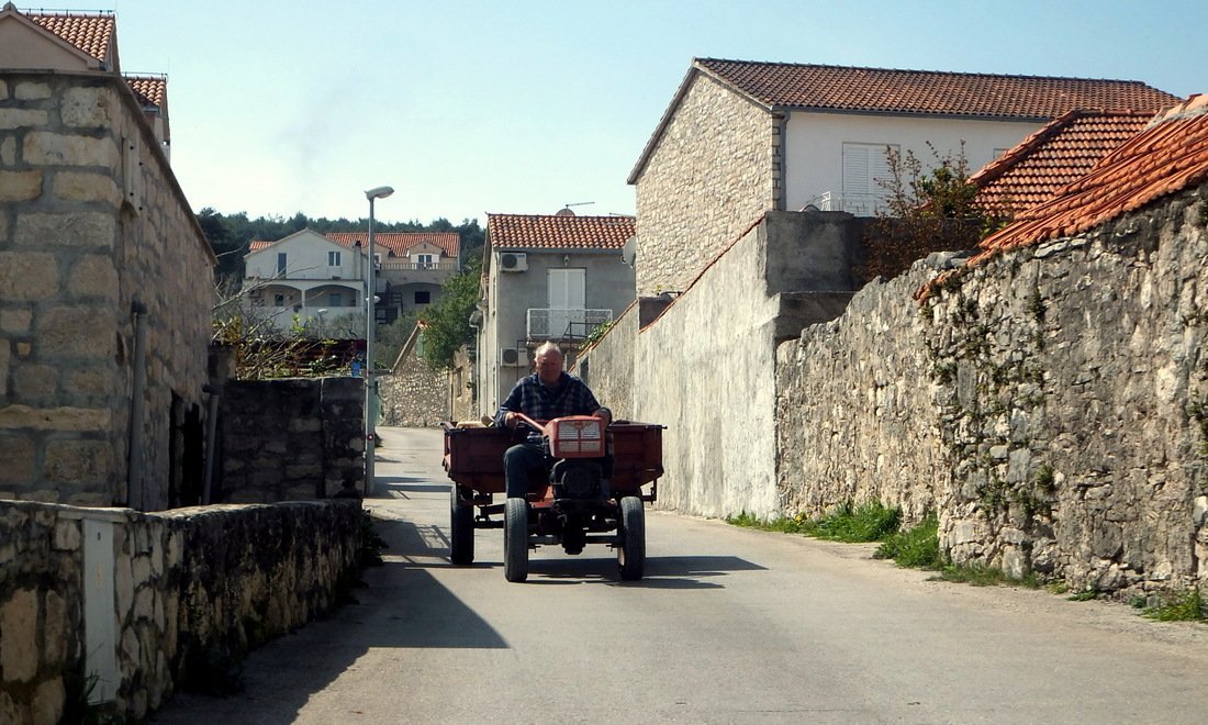A man rides a tractor - Day trip to Brač