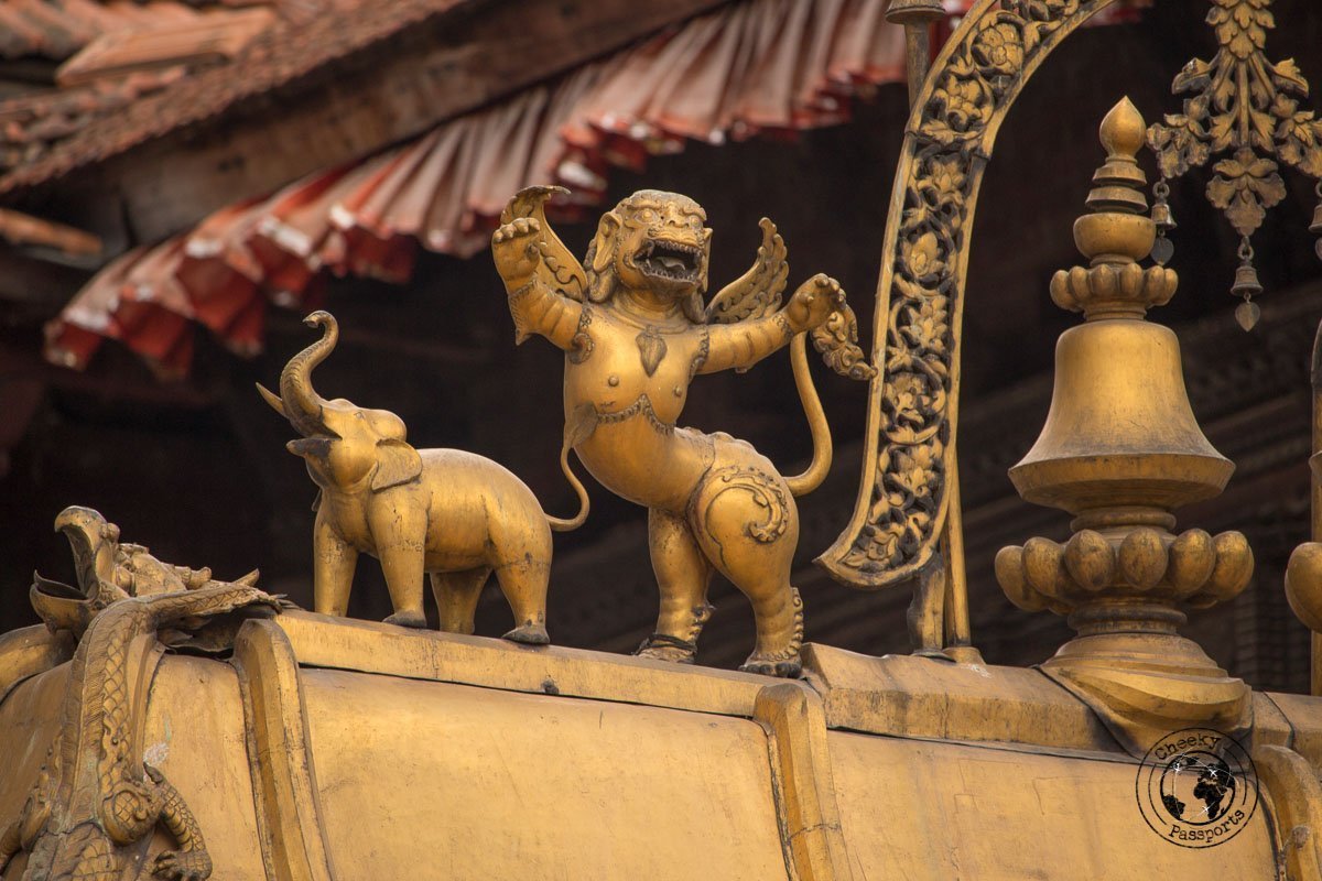 Intricate gilded figurines at the Golden Gate at Bhaktapur Durbar Square in Nepal