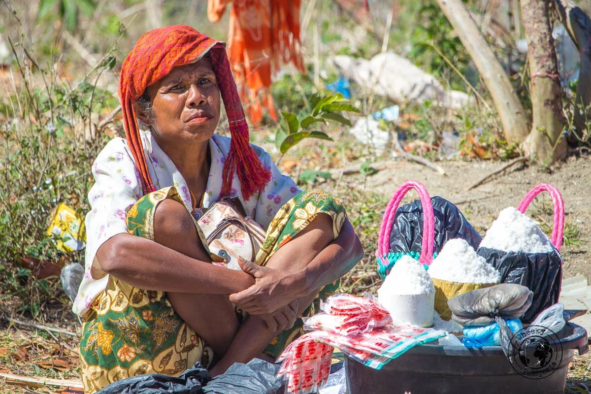 Meeting the Indonesian tribes. A Seller in the market at Desa Nusa which we visited whilst exploring west timor, indonesia. . West Timor Travel