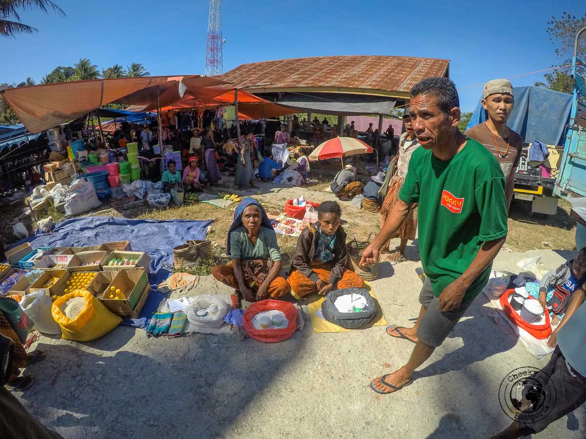 Our guide Timus at the Desa Nusa market whilst exploring west timor, indonesia. . West Timor Travel