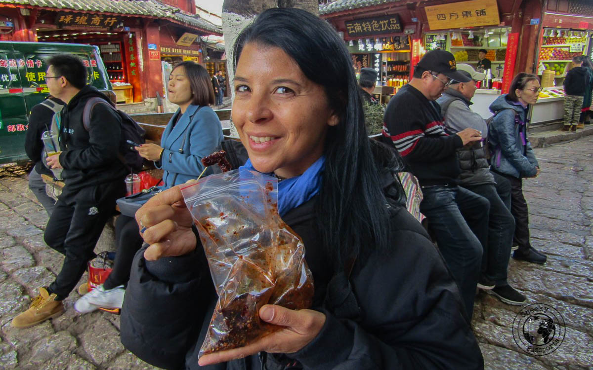 Michelle indulging in yak meat - Lijiang attractions, Yunnan, China