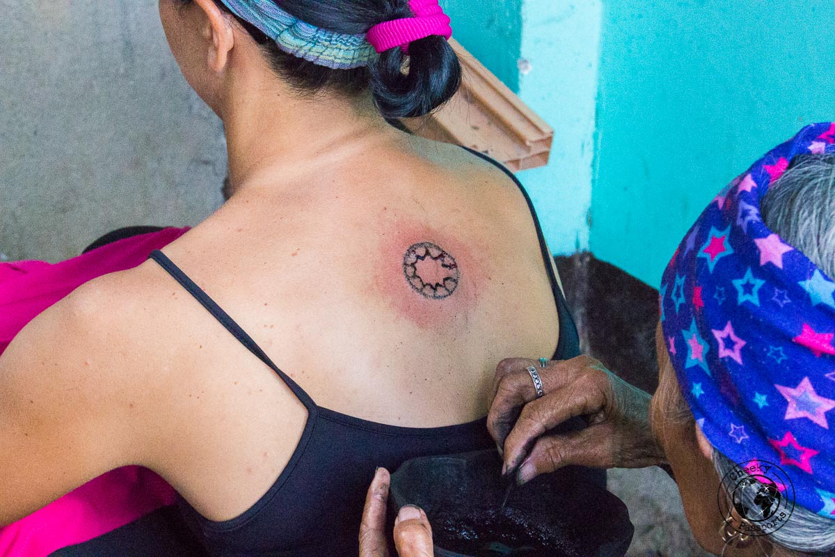 Michelle's Filippino Tribal tattoo in progress - Getting a Filipino Tribal Tattoo in Buscalan